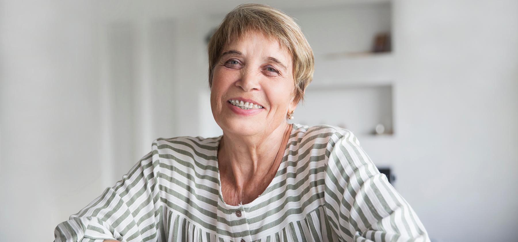 Woman smiling with clear braces