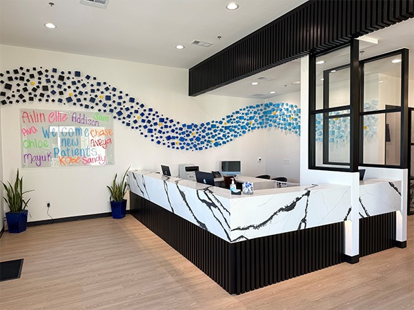 Reception desk of orthodontic office in Prosper and Frisco